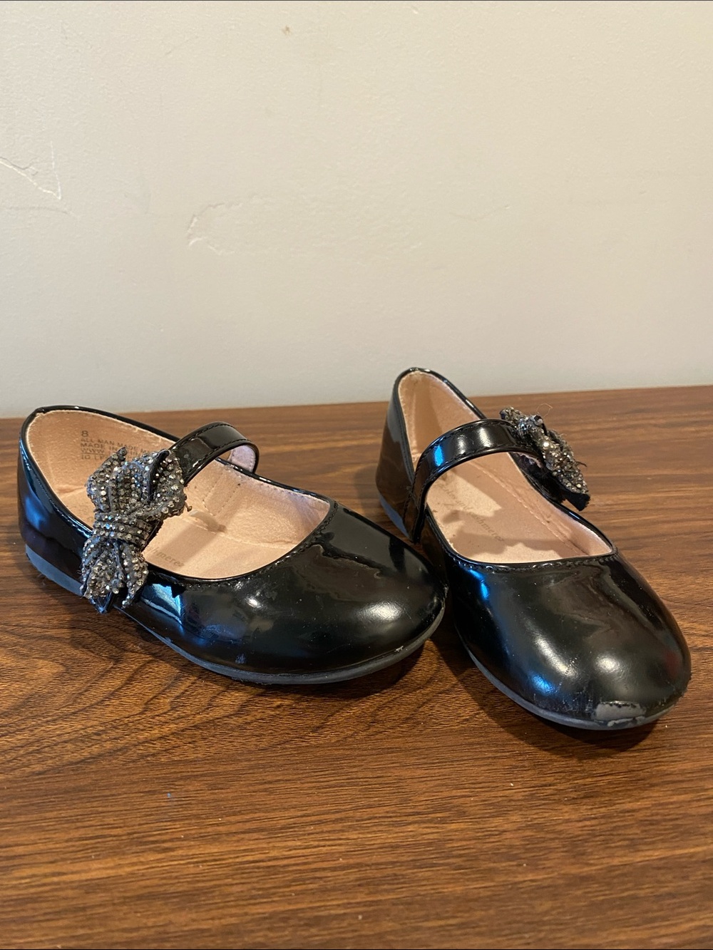 cupcakes & cashmere Black Patent Mary Jane Shoes with Jeweled Bow